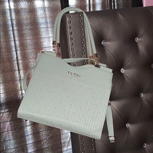 BEBE mint green handbag